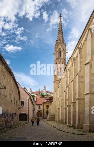 Farská street, Church of the Elevation of the Holy Cross,  Bratislava, Slovakia Stock Photo