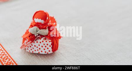 Motanka handmade Doll, family guard or great interior toy. Traditional Belarusian folk doll in Ethnic Costume with embroidered design Stock Photo