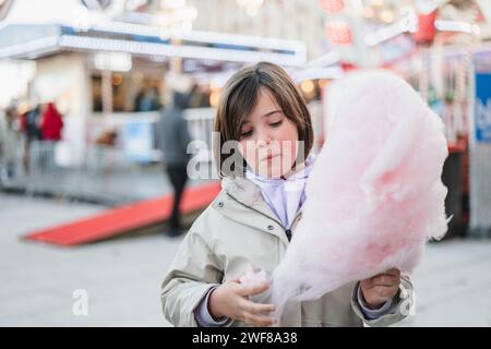 Blurred background of busy outdoor street festival market with lights ...