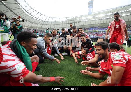 Doha, Qatar. 29th Jan, 2024. Team Jordan celebrate winning the round of 16 match between Iraq and Jordan at AFC Asian Cup Qatar 2023 in Doha, Qatar, Jan. 29, 2024. Credit: Cao Can/Xinhua/Alamy Live News Stock Photo