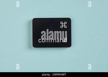 command key on blue background Stock Photo