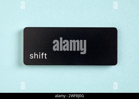 Shift key on cyan background Stock Photo