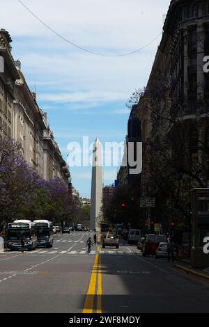 One of the city's most iconic monuments is the needle-like Obelisco, soaring 67m above the oval Plaza de la República on busy Av 9 de Julio. Stock Photo