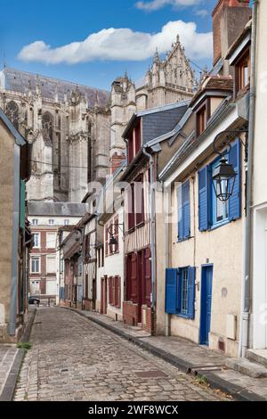 Beauvais, France - August 24 2020: The rue Nicolas Pastour is a narrow street with half-timbered townhouses leading to the Cathedral of Saint Peter of Stock Photo