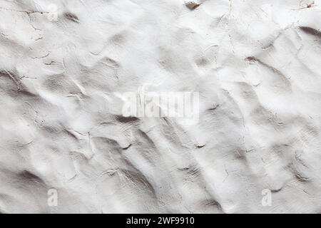 finger marks on a slab of gray clay Stock Photo