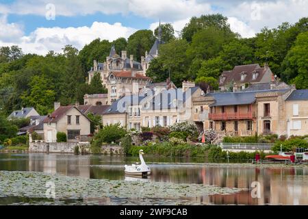 Pierrefonds, France - May 25 2020: Lake of Pierrefonds with the castle of Jonval on the hilltop. Stock Photo