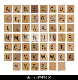 Mixed Vintage Wooden Scrabble Letters - Isolated Stock Photo
