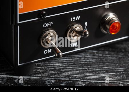 guitar amp power toggle macro closeup Stock Photo