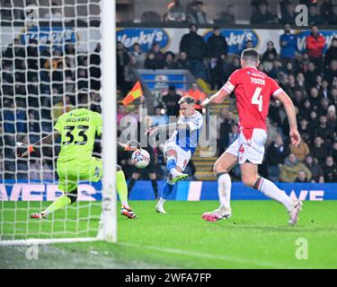 Sammie Szmodics of Blackburn Rovers takes a shoot and hits the cross