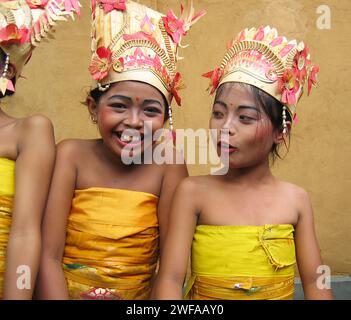 Children from a small village dressed in traditional Balinese dance costumes pose in Bangli,  Bali, Indonesia. Stock Photo