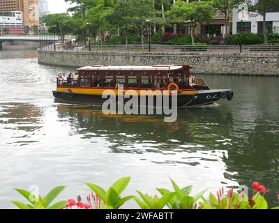 A boat at Robertson Quay on the Singapore River in Singapore. Stock Photo