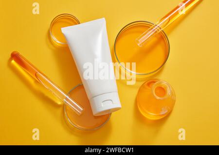 Laboratory setup with petri dishes and test tubes on a white surface ...