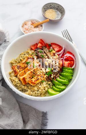 Healthy bowl with cauliflower rice, enoki mushrooms, chicken and vegetables. Keto/Paleo diet menu, low carb. Stock Photo