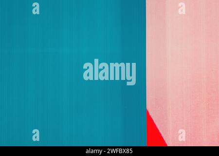 Printed poster paper surface with blue, red and pink tone color as texture and background Stock Photo