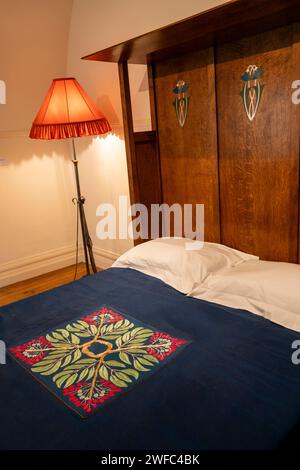 UK, Cumbria, Bowness on Windermere, Blackwell, Arts and Crafts House, Baillie Scott inlaid wood and pewter bed Stock Photo
