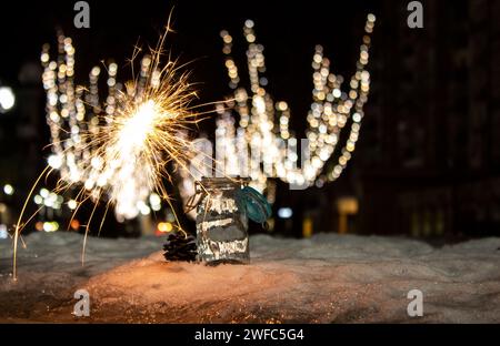 Flames of Bengal fire on the streets of the night city Stock Photo