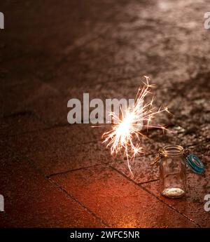 Flames of Bengal fire on the streets of the night city Stock Photo