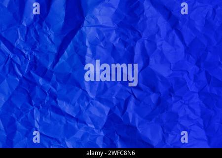 crumpled blue paper background texture close up copy space. Stock Photo