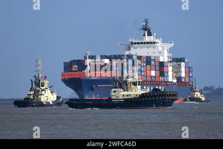 Buffeted by 20mph winds Svitzer tugs bring container ship CMA CGM ...