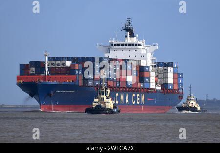 Buffeted by 20mph winds Svitzer tugs bring container ship CMA CGM ...