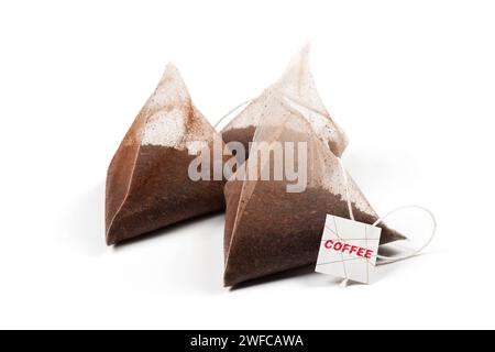 Coffee bag in the shape of a pyramid isolated on white background. Stock Photo