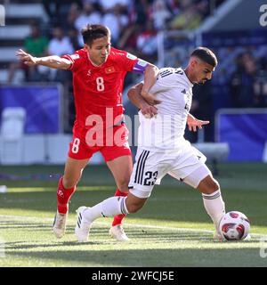 Doha, Qatar. 24th Jan, 2024. Merchas Doski of Iraq and Do Hung Dung of Vietnam during the AFC Asian Cup Qatar 2023, Group D football match between Iraq and Vietnam on January 24, 2024 at the Jassim bin Hamad Stadium in Doha, Qatar - Photo Najeeb Almahboobi/Najeeb Almahboobi/DPPI Credit: DPPI Media/Alamy Live News Stock Photo