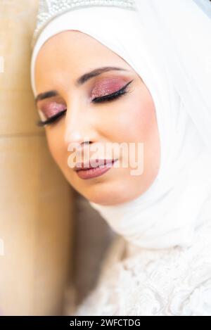 Beautiful Muslim bride outdoors Stock Photo