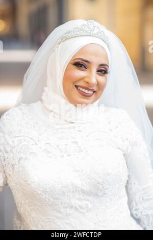 Beautiful Muslim bride outdoors Stock Photo