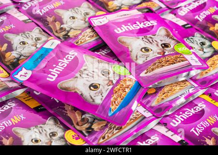 Dnipro, Ukraine - August 04, 2023: Various Whiskas cat food ready for sale on supermarket shelves. Cat food as background Stock Photo