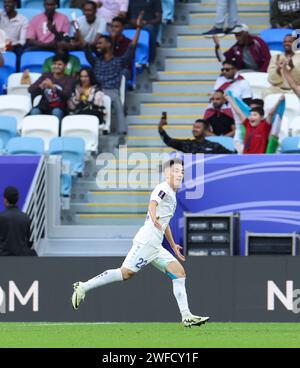 Doha, Qatar. 30th Jan, 2024. Uzbekistan's Abbosbek Fayzullaev celebrates scoring during the round of 16 match between Uzbekistan and Thailand at AFC Asian Cup Qatar 2023 in Doha, Qatar, Jan. 30, 2024. Credit: Ding Ting/Xinhua/Alamy Live News Stock Photo