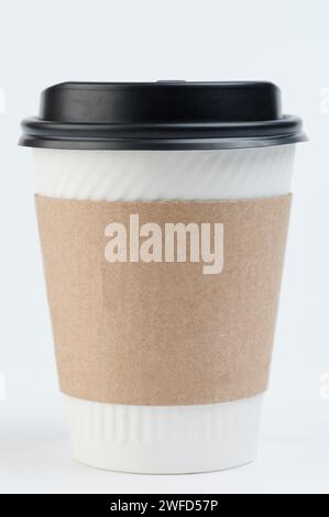 One clean paper cup with lid and sleeve front view isolated Stock Photo