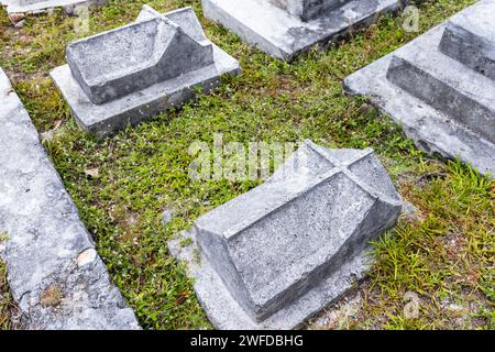 Gray gravestones at La Digue cemetery, Seychelles Stock Photo