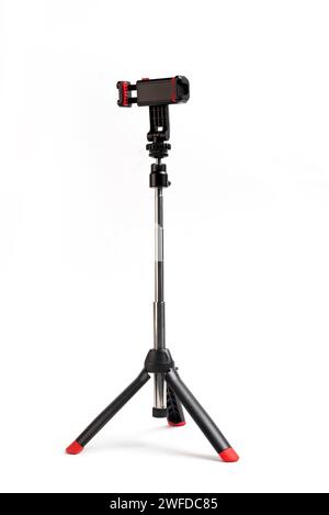 Telescopic phone tripod isolated on white background Stock Photo