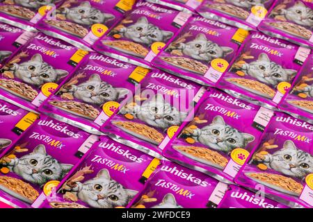 Dnipro, Ukraine - August 04, 2023: Various Whiskas cat food ready for sale on supermarket shelves. Cat food as background Stock Photo