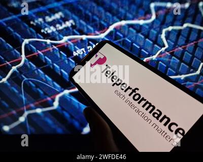 Konskie, Poland - January 27, 2024: Teleperformance company logo displayed on mobile phone screen Stock Photo