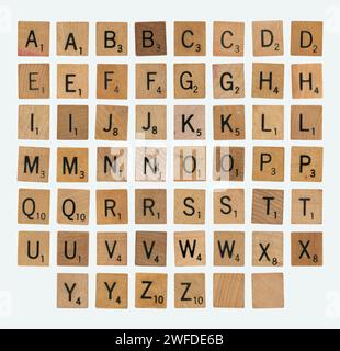 Set of Mixed Scrabble Game Pieces - Full Alphabet Isolated Stock Photo