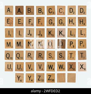 Set of Mixed Scrabble Game Pieces - Full Alphabet Isolated Stock Photo