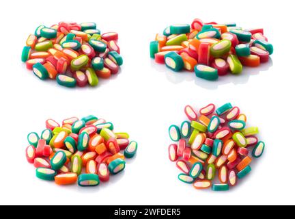 Piles of delicious colorful jelly candies on white background. Stock Photo