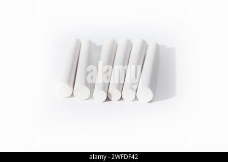 white chalk sticks isolated on white background Stock Photo