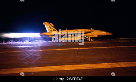 Red Sea, United States. 12 January, 2024. A U.S. Navy F/A-18F Super Hornet fighter jet, performs a night-time launch off the flight deck of the Nimitz-class aircraft carrier USS Dwight D. Eisenhower to perform a combat sortie against the Iranian-backed Houthi, January 12, 2022 in the Red Sea. The Eisenhower aircraft are in support of Operation Prosperity Guardian to prevent attacks on commercial shipping in the region.  Credit: MC2 Zachary Elmore/U.S. Navy Photo/Alamy Live News Stock Photo