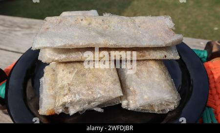 Traditional Andhra sweet Pootharekulu made from paper thin sheet made ...