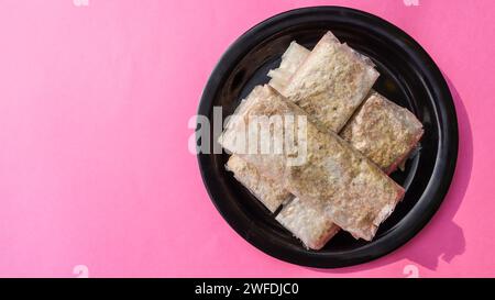 Traditional Andhra sweet Pootharekulu made from paper thin sheet made ...