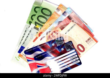 Euros and UK Global Health Insurance Card. Stock Photo