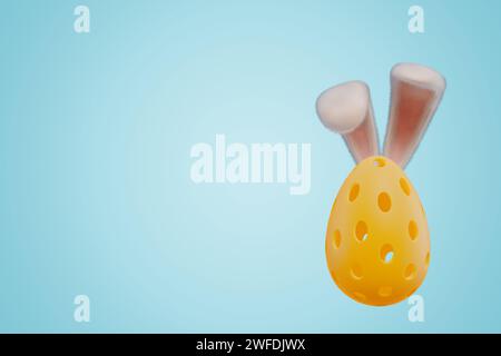 Sports pickleball ball in the shape of an egg with Easter bunny ears on an isolated background. 3d rendering Stock Photo