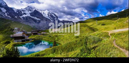 amazing Swiss nature . Kleine Scheidegg mountain pass that runs between the famous Eiger and the Lauberhorn famous for hiking in Bernese Alps. Switzer Stock Photo