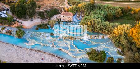 Most famous natural thermal hot spings pools in Tuscany - scenic Terme di Mulino vecchio ( Thermals of Old Windmill) in Grosseto province.  high angle Stock Photo