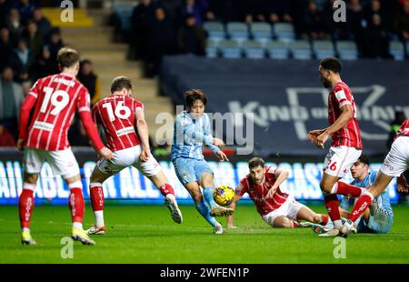 Coventry City's Tatsuhiro Sakamoto attempts a shot on goal during the Sky Bet Championship match at the Coventry Building Society Arena, Coventry. Picture date: Tuesday January 30, 2024. Stock Photo