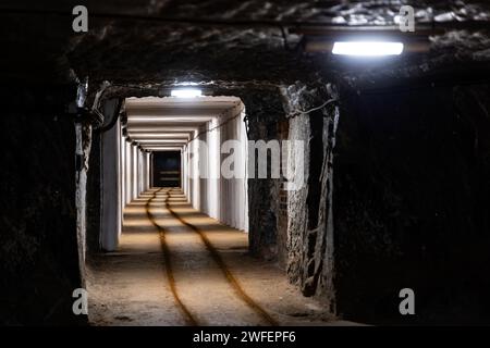 Wooden casing around the historic mine gallery. Traditional materials used in mine security Stock Photo