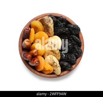 Bowl of tasty dried fruits for Ramadan on white background Stock Photo