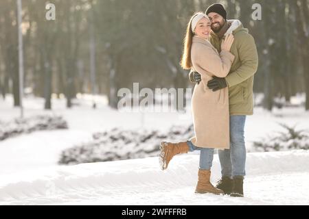 Beautiful young couple enjoying winter day outdoors Stock Photo